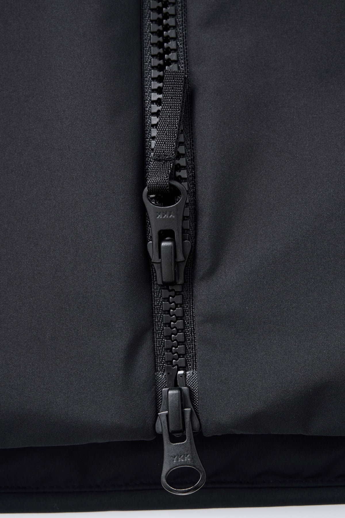 YKK® two-way zipper for smooth, flexible movement