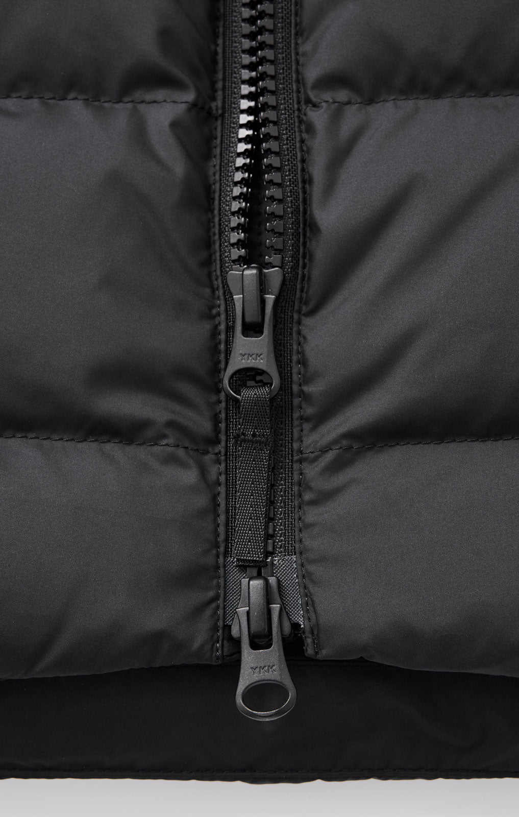 YKK® dual-slider zipper for flexible adjustment and easy movement