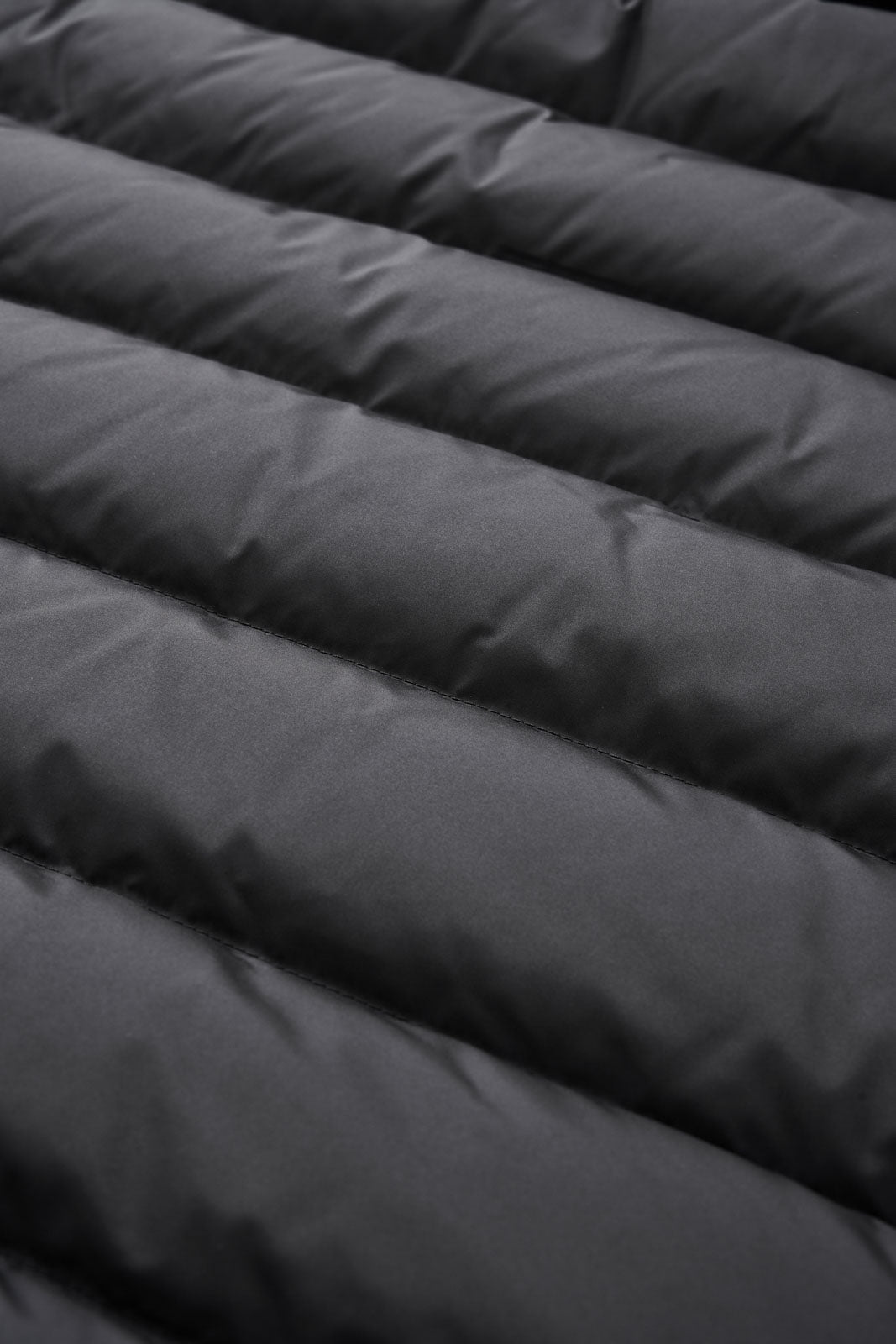 Precision construction for reliable goose down warmth and reduced down leakage