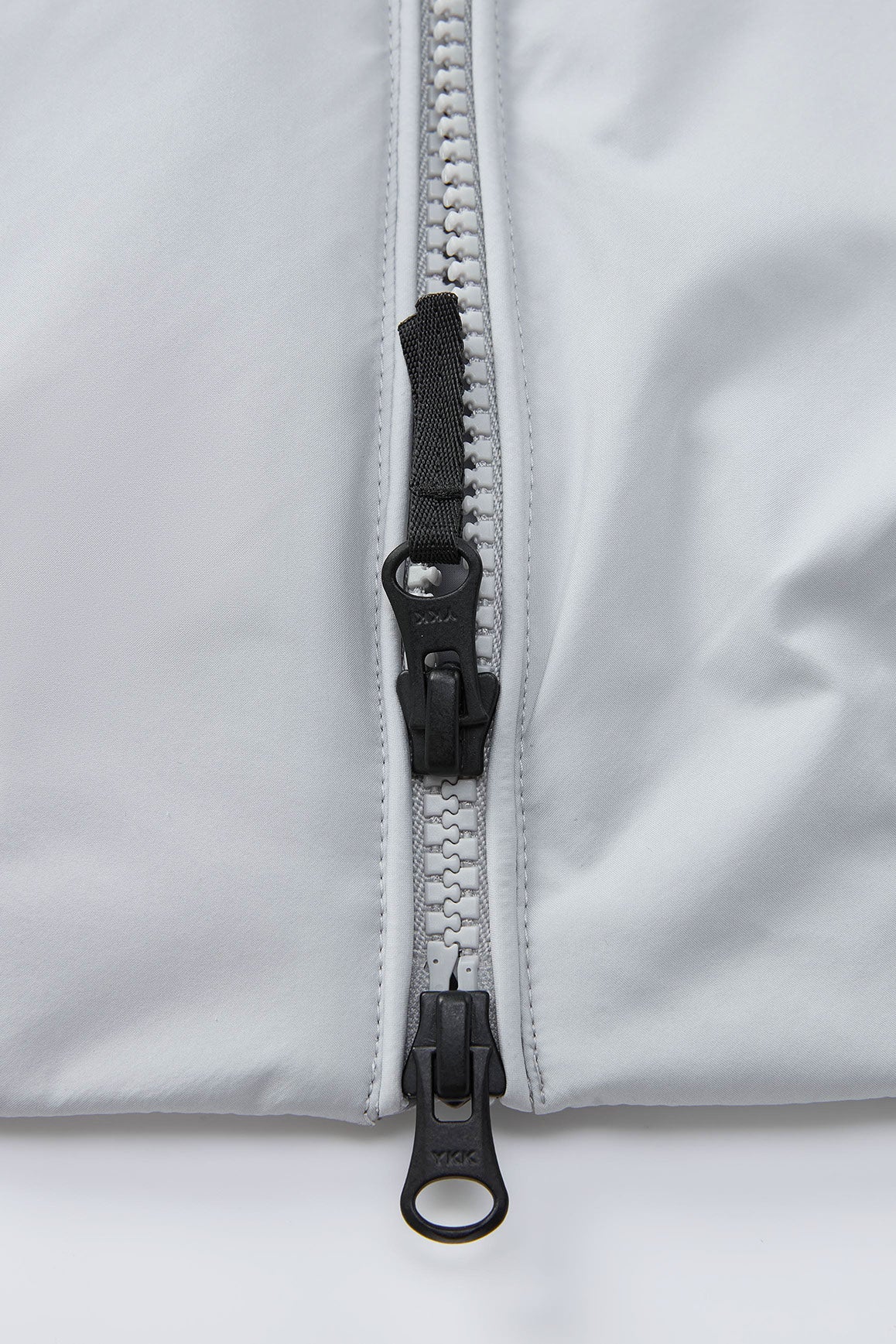 YKK® dual-slider zipper for adjustable comfort and movement