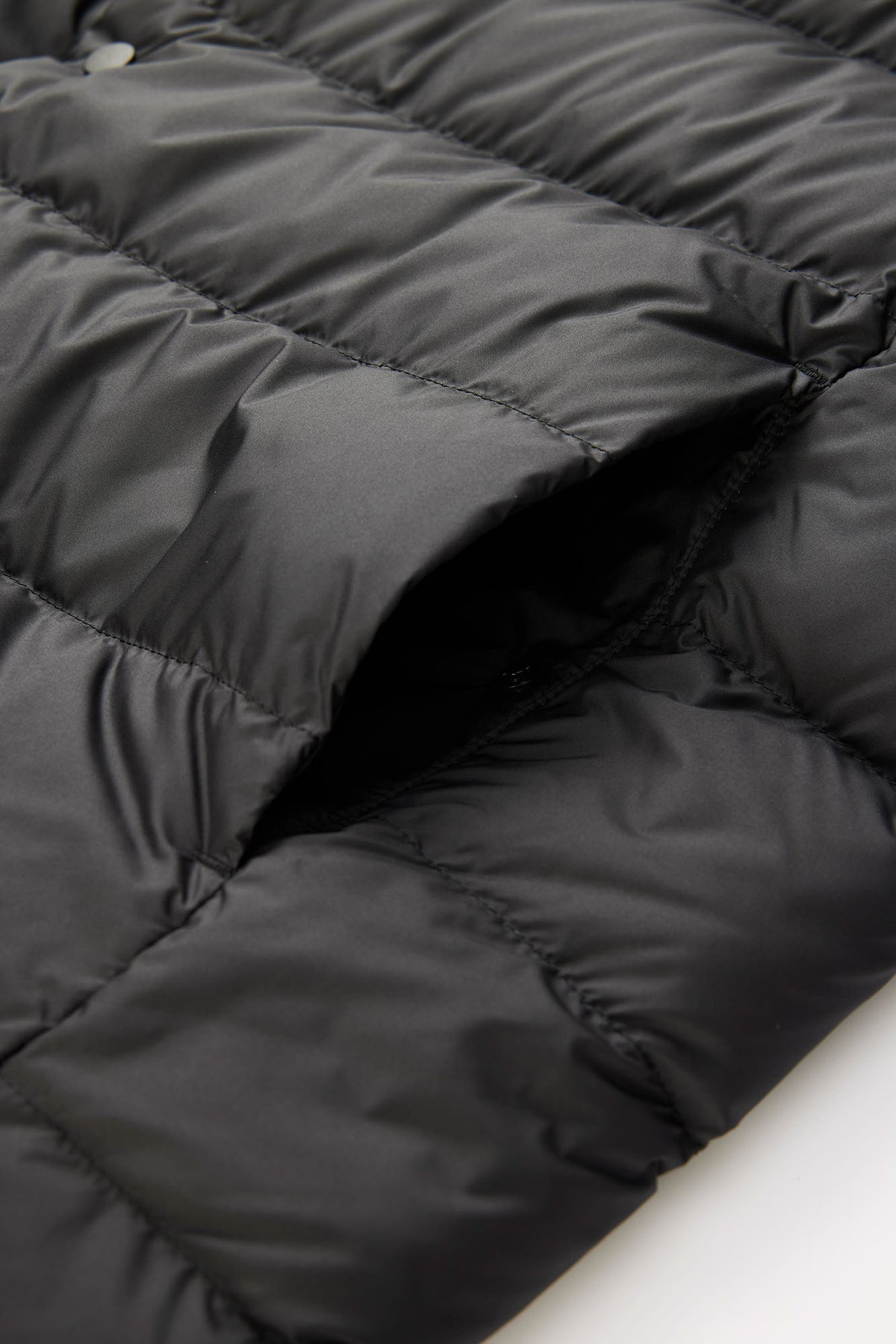 Multi-layer construction to help prevent down leakage